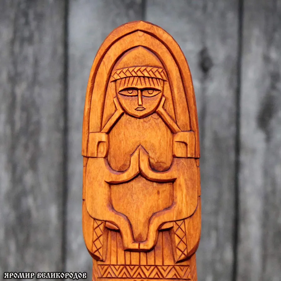 Лада - славянская богиня любви и красоты, прекрасная женщина с венком из цветов.