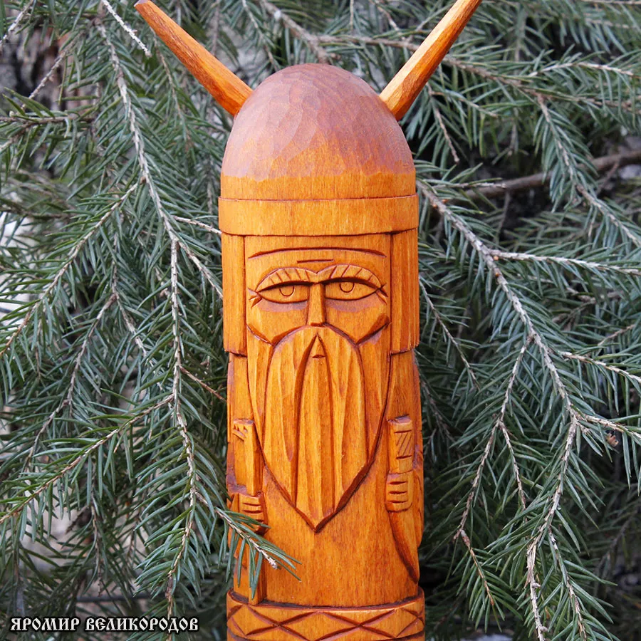 Велес - славянский бог мудрости, скота и подземного мира, с рогами и посохом.